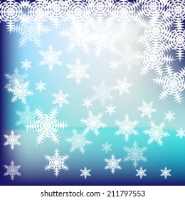Abstract blue and white christmas background with snowflakes