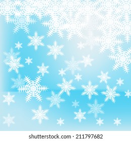 Abstract blue and white christmas background with snowflakes