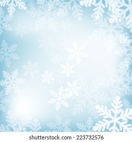 Abstract blue and white christmas background with snowflakes