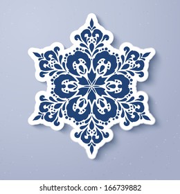 Abstract blue winter snowflake on a white sheet of paper. Vector illustration for your design.