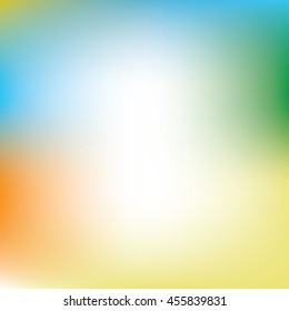 Abstract blur background in orange, yellow, blue and green colors