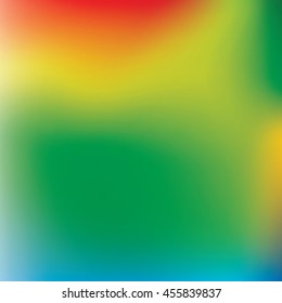 Abstract blur background in orange, yellow, blue and green colors