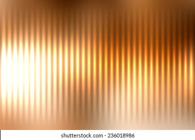 Abstract blur colored background with defocused vertical rays of light.