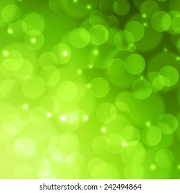 Abstract blur green light background. Bokeh effect. Spring season