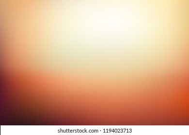 Abstract blurred background in golden orange and yellow tones. Autumn colors vector illustration. Sunset scene color gradient