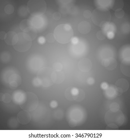 Abstract blurred background of silver  shiny Christmas tree decorations. Vector illustration