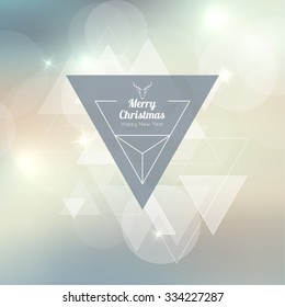 Abstract blurred vector background with triangular banner and hovering triangles. Merry Christmas. Happy New Year.