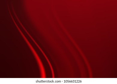 Abstract blurry background in red tones made of soft waves of color.