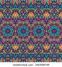 Abstract boho bright festive pattern for fabric.Abstract geometric colorful seamless mandala flower print.