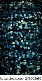 Abstract Bokeh Background: A mesmerizing abstract image featuring a captivating array of bokeh lights. The photograph showcases a beautiful blend of blue and white circular light patterns.