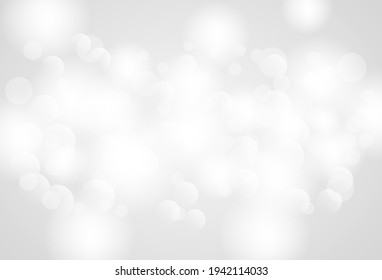 Resumen. la luz borrosa de bokeh sobre el fondo blanco. vector.