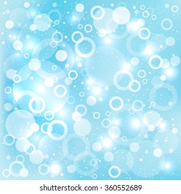 abstract bokeh different dreams circles illuminated white color on blue background