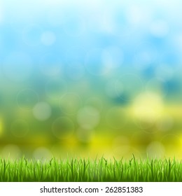 abstract bokeh and lens flare pattern with natural green grass and blue sky background (vector)