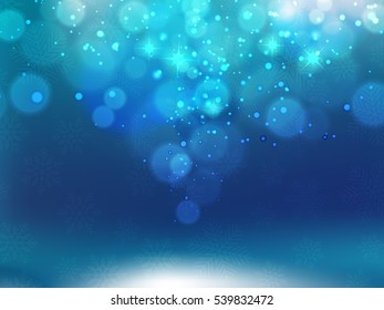 Abstract bokeh light blue background.