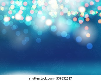 Abstract bokeh light blue background.