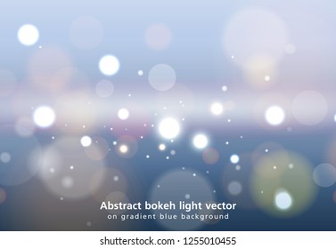 Abstract bokeh light vector on gradient blue background