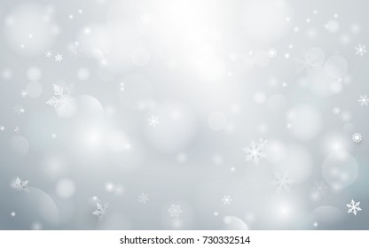 Abstract  bokeh and snowflakes in white background. Merry christmas concept