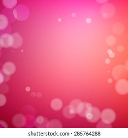 Abstract bokeh sparkles on red blurred background