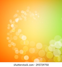 Abstract bokeh sparkles on yellow blurred background