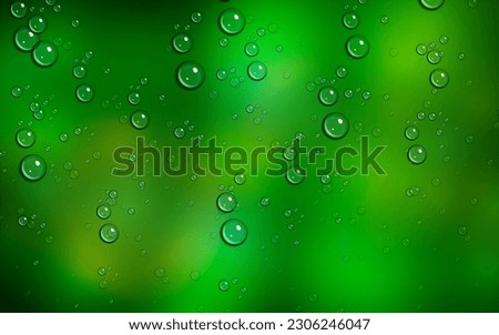 abstract bokeh with water drop, clear bubbles in green background.