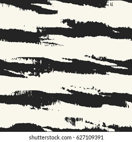 Abstract bold brushstrokes textured irregular striped motif. Seamless pattern.