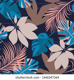 Abstract bright seamless background with colorful tropical leaves and plants on blue background. Vector design. Jungle print. Floral background. Printing and textiles. Exotic tropics. Fresh design.