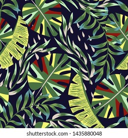 Abstract bright seamless pattern with colorful tropical leaves and plants on blue background. Vector design. Jungle print. Floral background. Printing and textiles. Exotic tropics. Summer design.