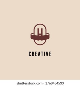 abstract brown capsule H logotype simple design concept.