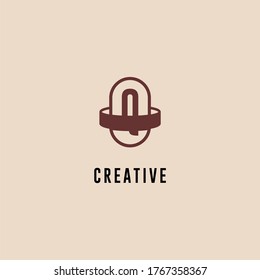 abstract brown capsule Q logotype simple design concept.