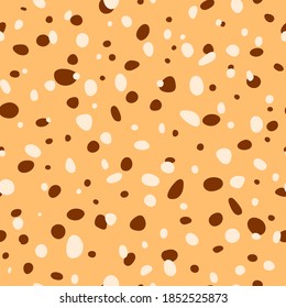 ovalos marrones abstractos. patrón sin costuras vectorial. fondo repetitivo caótico. muestra de tela. papel envolvente. impresión continua. elemento de diseño para la decoración del hogar, prendas de vestir, estuche de teléfono, textiles, tela