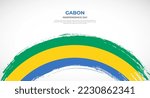 Abstract brush flag of Gabon in rounded brush stroke effect vector illustration
