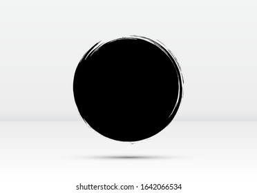 Abstract brushed black ink circle with rough edges and grungy texture. Dark inky dot