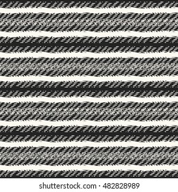Abstract brushed striped textured seamless pattern.