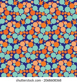 Abstract bubble hexagon vector seamless pattern background. Funky backdrop with honeycome style circles in neon orange, blue, indigo. Geometric repeat with varied bubbles. All over print for summer