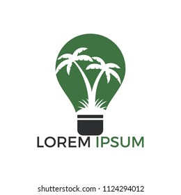 Abstract bulb lamp with palm tree logo design.  Nature travel innovation symbol. Tour and travel concept design.