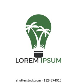 Abstract bulb lamp with palm tree logo design.  Nature travel innovation symbol. Tour and travel concept design.