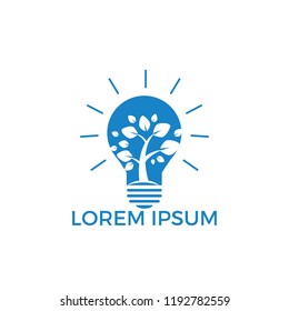 Abstract bulb lamp with tree logo design.  Light Bulb with tree plant inside vector.