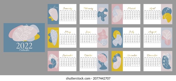 Calendario abstracto para 2022 en formato horizontal A5. La semana comienza el lunes. Calendario para 2022 por meses con cobertura, con manchas de color de tendencia y plantas de línea, texto de gradiente dorado.