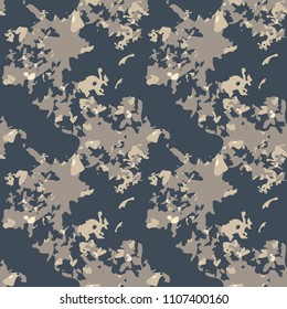 Abstract camo background as urban camouflage in different shades of beige, brown and blue. Seamless repeat pattern - UFO paintball or strikeball camoflauge, wallpaper, backdrop, print for textile