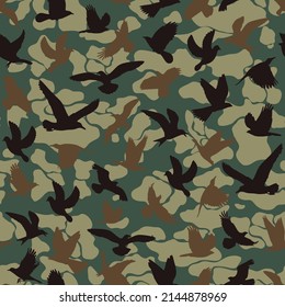 Abstract camouflage with birds, seamless green print, forest pattern. Disguise.