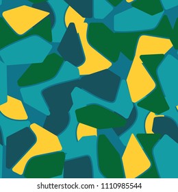 An abstract camouflage pattern containing uneven spots of different colors. Fashionable texture.