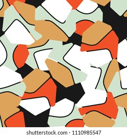 An abstract camouflage pattern containing uneven spots of different colors. Fashionable texture.