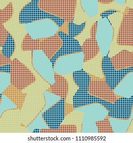 An abstract camouflage pattern containing uneven spots of different colors. Fashionable texture. A network of small mutually perpendicular ovals.