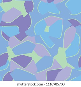 An abstract camouflage pattern containing uneven spots of different colors. Fashionable texture.