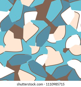 An abstract camouflage pattern containing uneven spots of different colors. Fashionable texture.