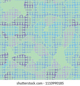 An abstract camouflage pattern containing uneven spots of different colors. Fashionable texture. Chess network consisting of divided ovals.