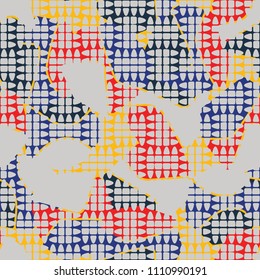 An abstract camouflage pattern containing uneven spots of different colors. Fashionable texture. Chess network consisting of divided ovals.