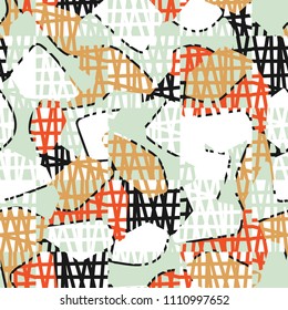 An abstract camouflage pattern containing uneven spots of different colors. Fashionable texture. A network of torn squares arranged in staggered order.