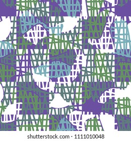 An abstract camouflage pattern containing uneven spots of different colors. Fashionable texture. A network of torn squares arranged in staggered order.