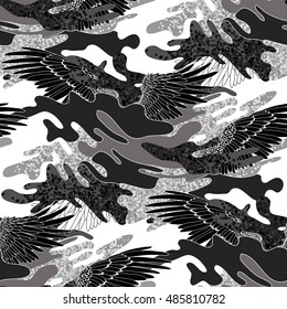 Abstract camouflage seamless pattern. Trendy fabric design in black and white colors. Wings and splashes.